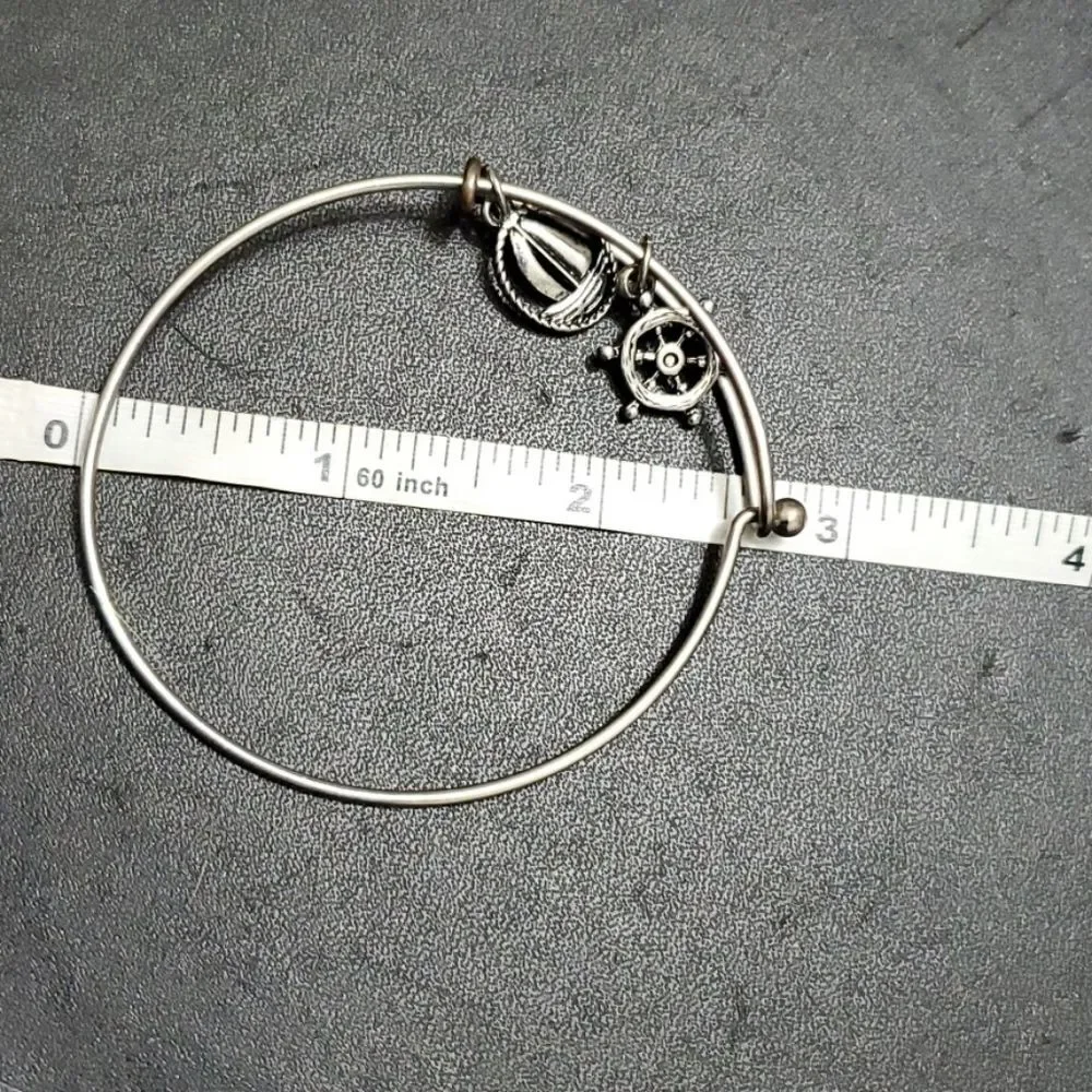 Silver tone sailing themed charm bangle bracelet 7.25